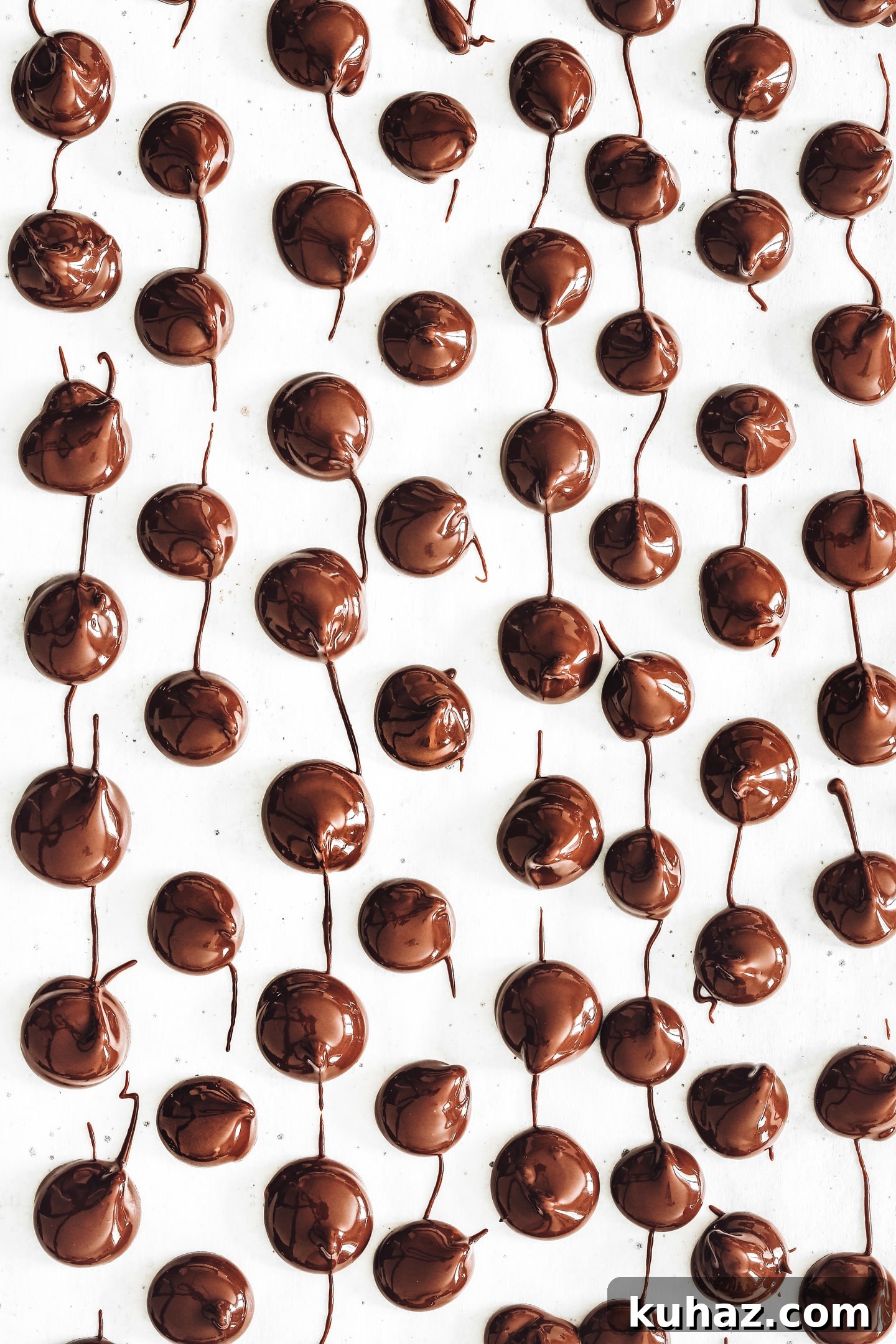 freshly piped chocolate chips on parchment paper
