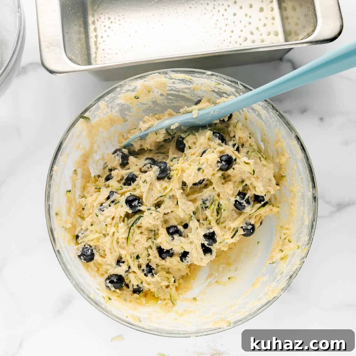 Bread batter in a mixing bowl.