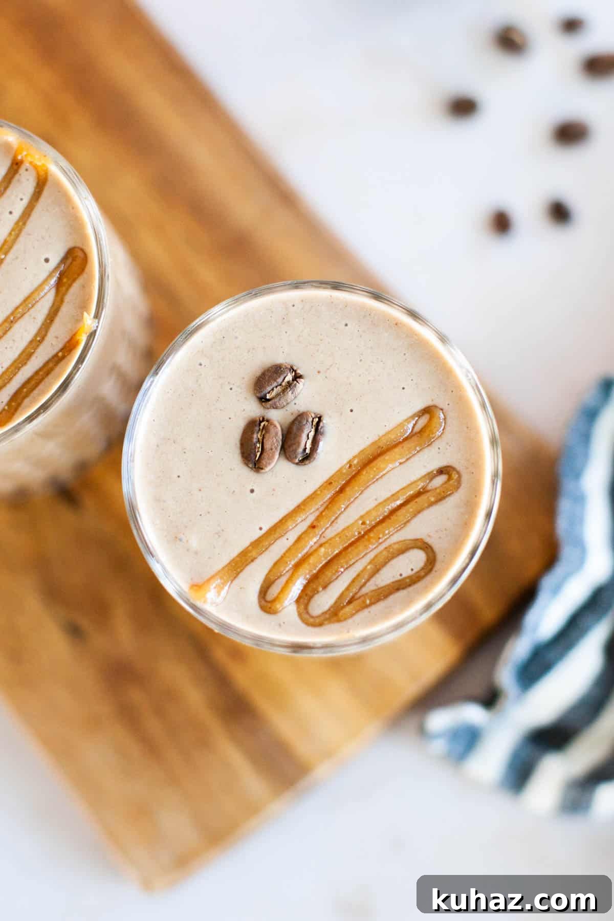 An overhead shot of a coffee smoothie in a glass.