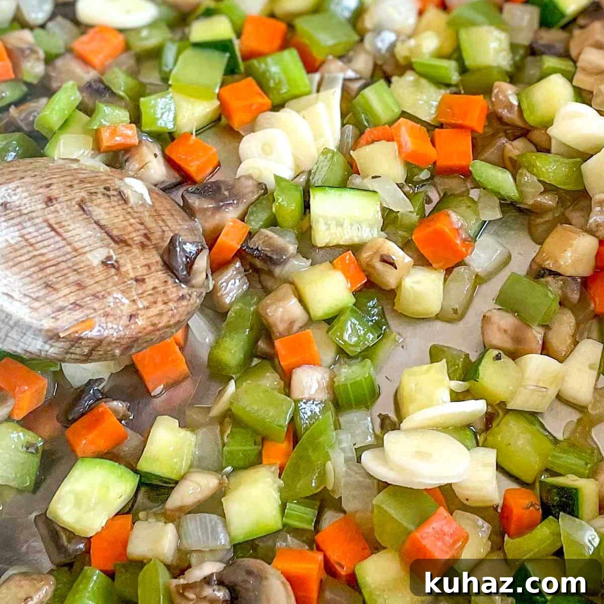 Linguine with Classic Bolognese Sauce 5 Garlic is added to the vegetables sweating in the pan.