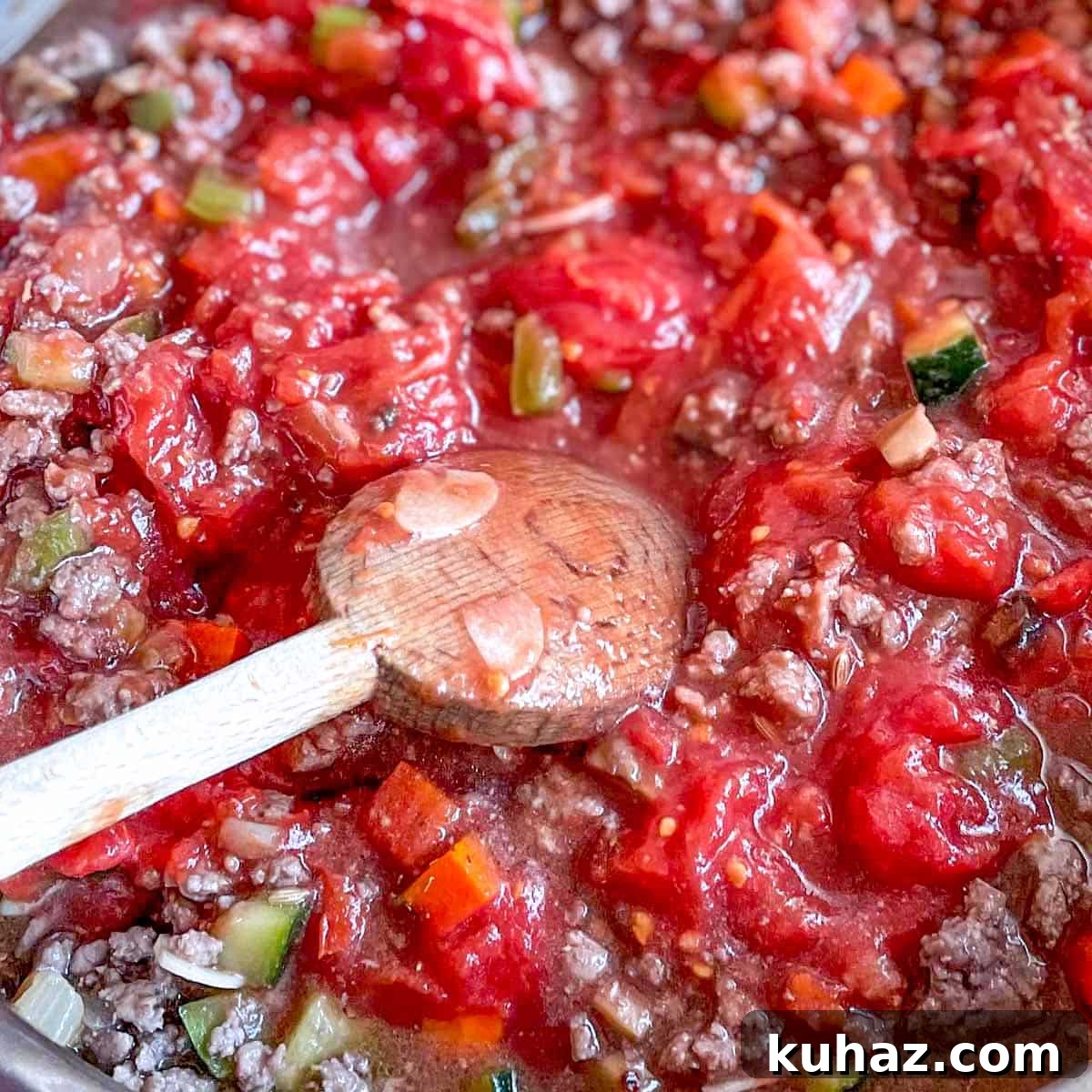 Linguine with Classic Bolognese Sauce 8 Crushed whole peeled tomatoes are added to the browned meat and vegetables.