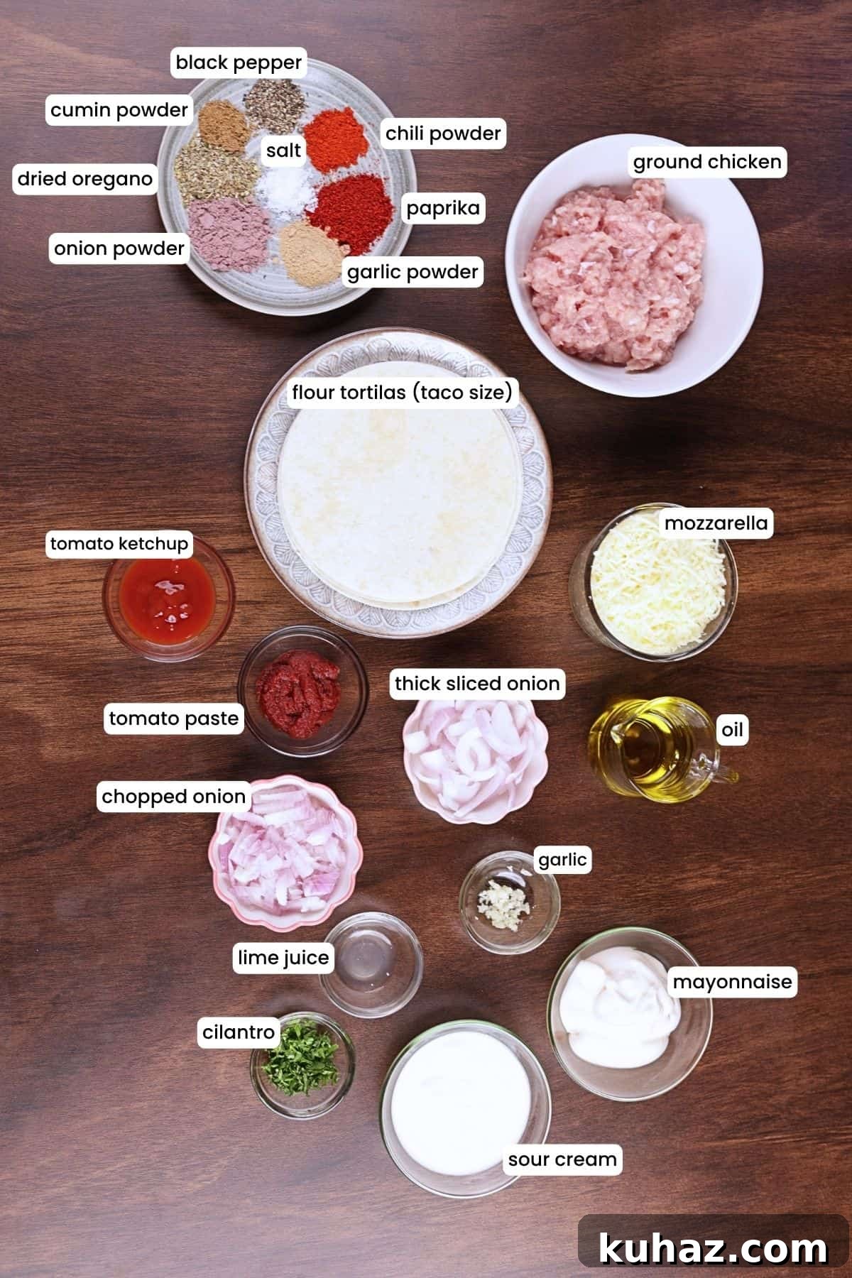 Crispy Ground Chicken Tacos with Crunchy Shells 3 All ingredients for ground chicken tacos including chicken, tortillas, mozzarella, onion, and seasoning spices.