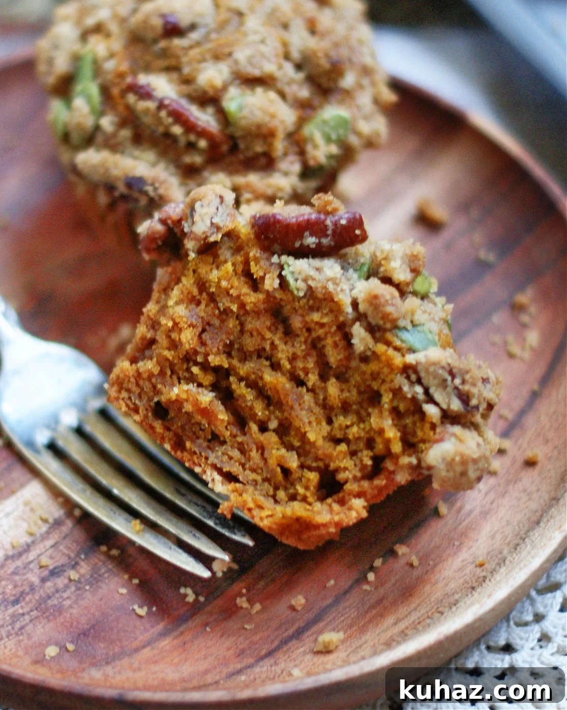Pumpkin Muffins with Cinnamon Streusel 3 inside of moist pumpkin muffins to show tender texture