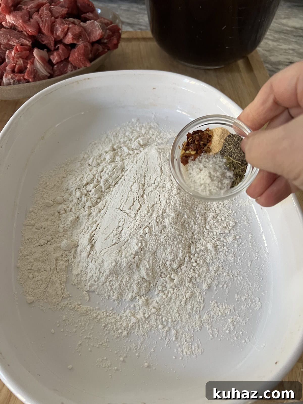 Italian Beef and Potato Soup - Nonna Pot-Roast 6 Making seasoned flour by mixing spices with flour.