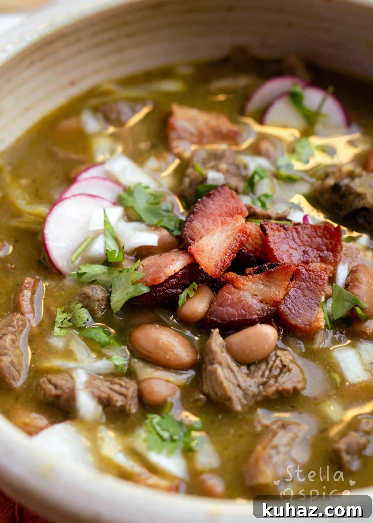 a bowl of hot carne en su jugo with toppings
