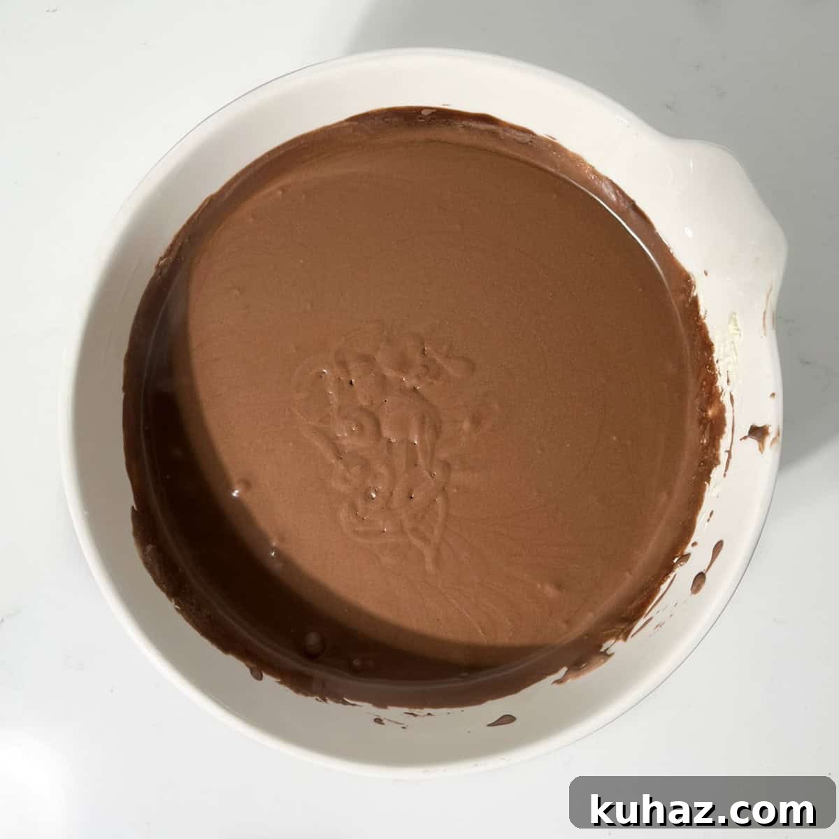 No-Churn Dark Chocolate Ice Cream Recipe 9 Mixture for dark chocolate ice cream in a large white bowl.