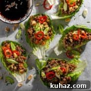 Yuk Sung on a white serving plate with a bowl of soy sauce.