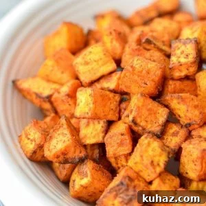 A close up of sweet potato cubes that have been roasted.