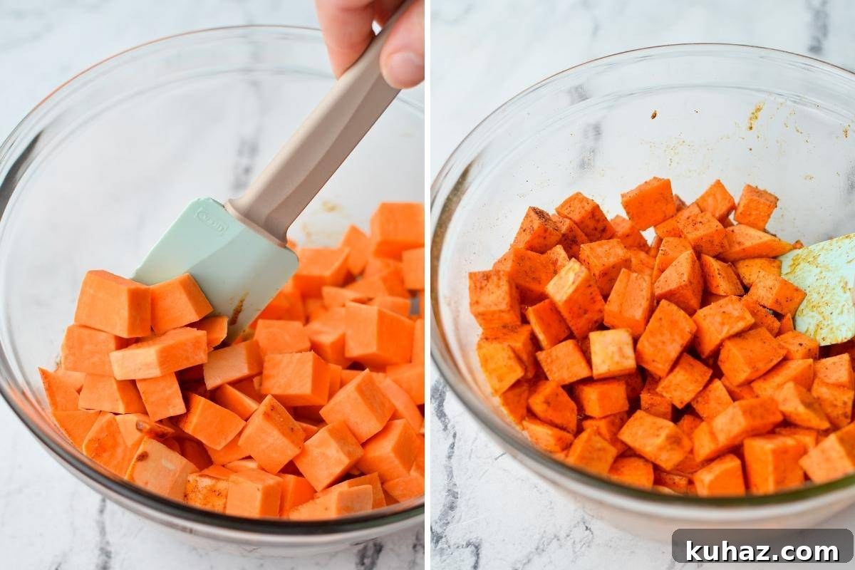 Crispy Air Fryer Sweet Potato Cubes 6 Tossing sweet potatoes with a seasoned oil.