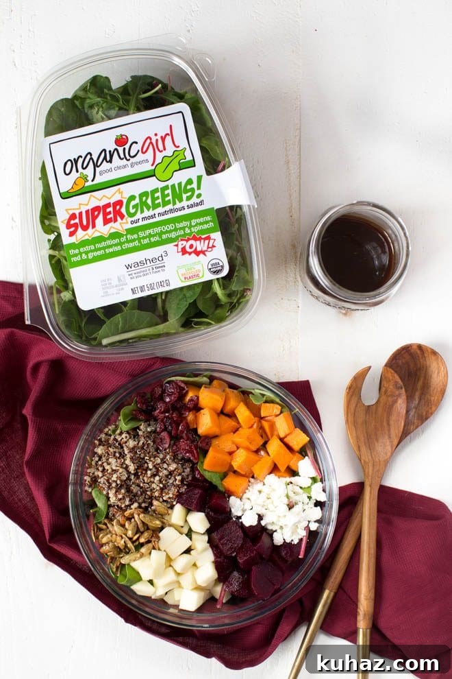 Roasted Sweet Potato, Beet, Apple and Quinoa Salad is made with fresh greens, vegetables, spiced pepitas, dried cranberries, goat cheese and a simple balsamic honey dressing!