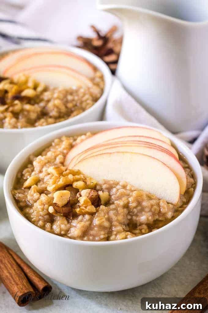 How to Make Creamy Instant Pot Steel Cut Oats 5 The finished steel cut oats topped with sliced apples.