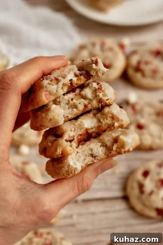Light golden rhubarb cookies with white chocolate chips and chopped almonds.