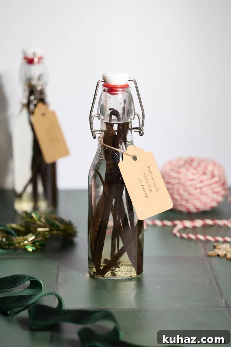 Two bottles of Homemade Vanilla Extract with brown tags.