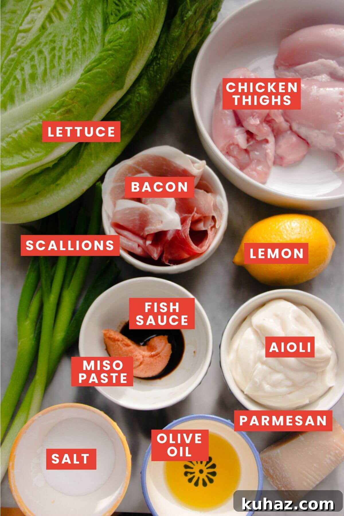 Chicken caesar flatbread ingredients laid out and labelled.