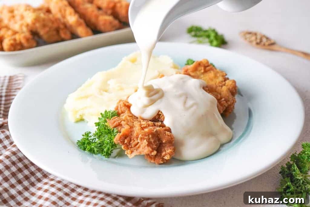 What to Serve with Green Beans 25 Tasty Pairings 10 gravy pouring over chicken fried chicken