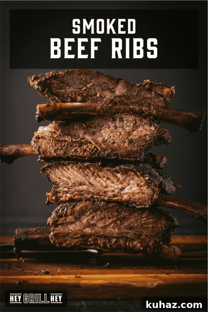 Smoked Beef Ribs Recipe: Fall-Off-the-Bone BBQ 2 Stack of beef ribs on a wooden cutting board with text overlay - Smoked Beef Ribs.