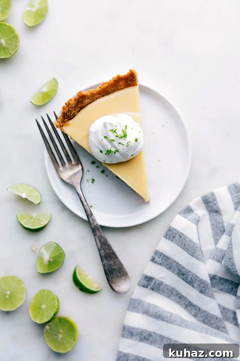 Key Lime Pie Slice - Creamy and Tangy Delight Slice of creamy key lime pie with a dollop of whipped cream on top.