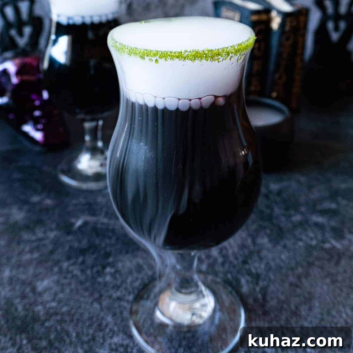 Easy cauldron cocktail for Halloween served as a spooky party drink.