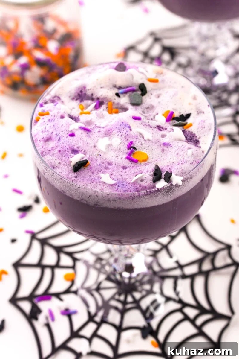 Witches Brew Punch with rainbow sherbet for a Halloween party.