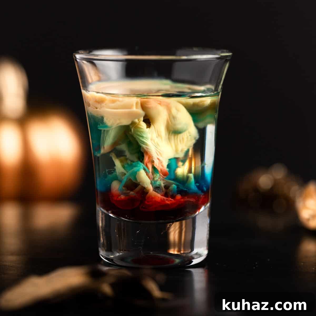 Alien Brain Hemorrhage shot with peach schnapps, Baileys, blue curaçao, and grenadine.