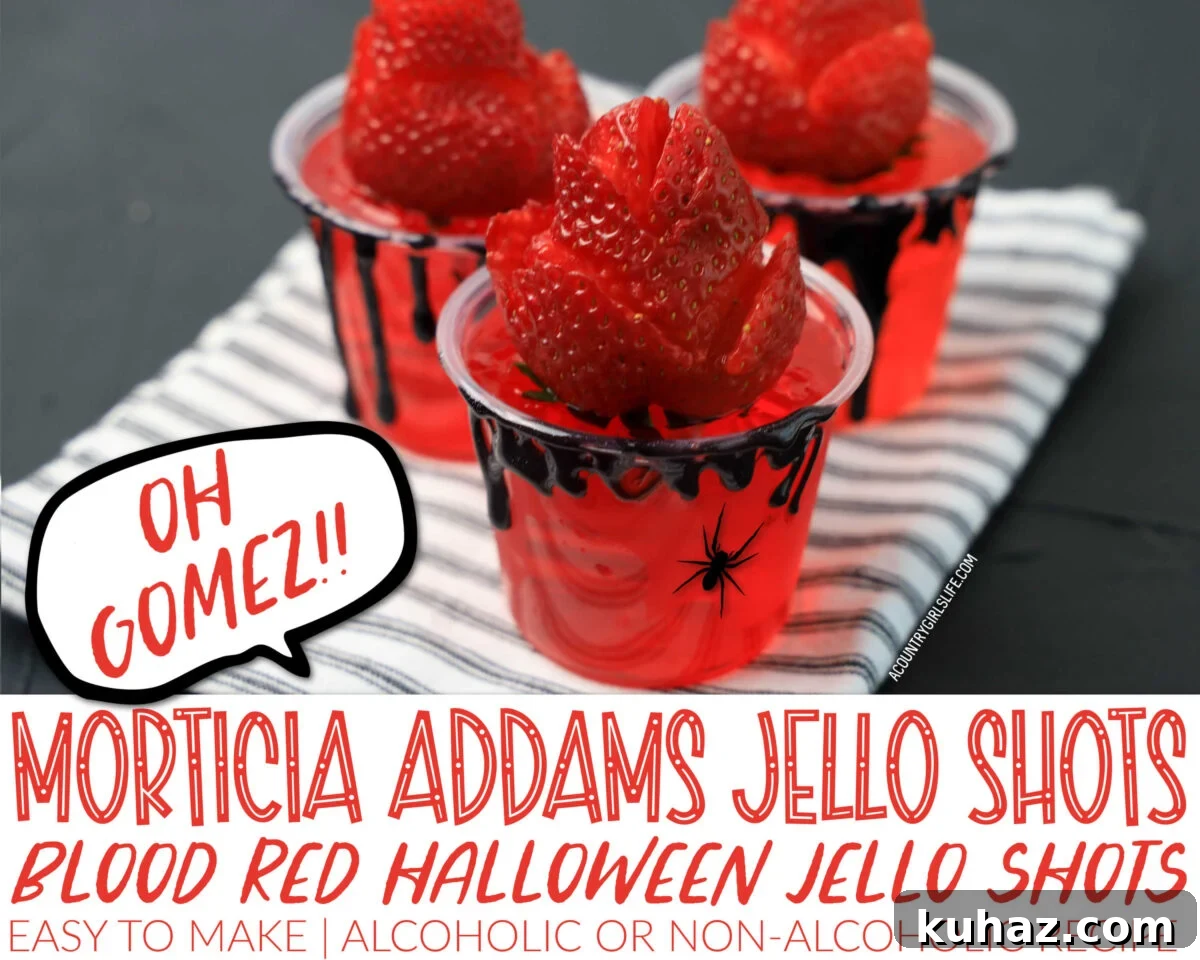 Blood-red Halloween jello shots inspired by Morticia Addams with strawberry rose garnish.