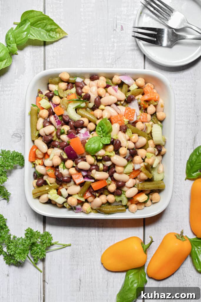 A square plate holds the 10 minute four bean salad