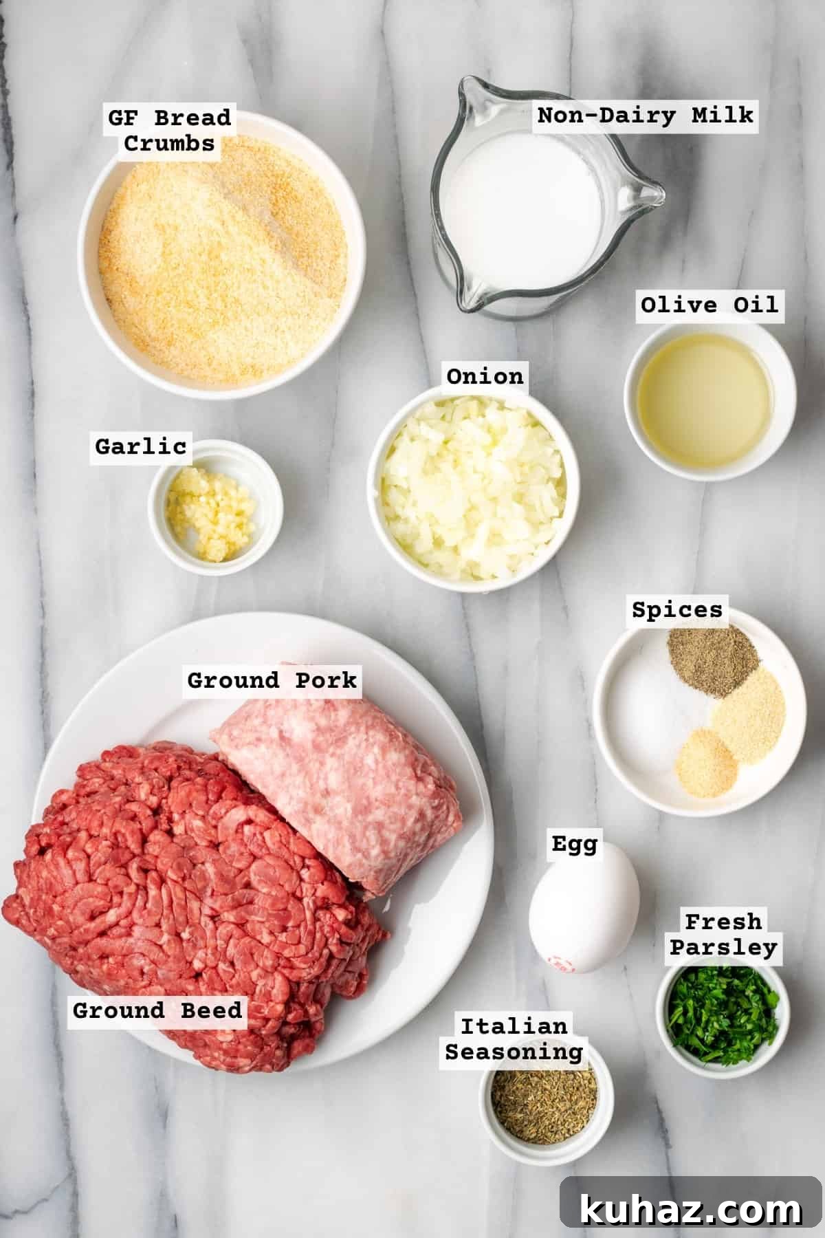 Ingredients for gluten free meatballs on a white table.