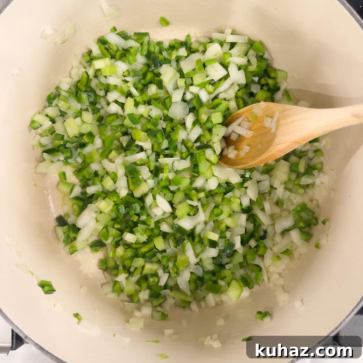 Zesty Tomatillo Soup Recipe with Chicken or Turkey 5 Sautéing onion, celery, and green chilies in a dutch oven for tomatillo soup.
