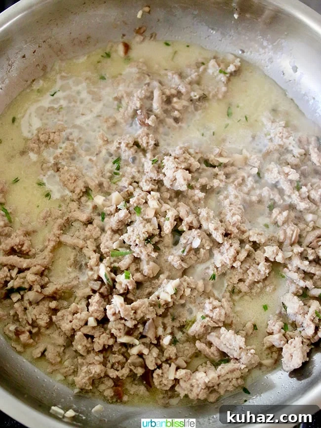 meat and mushrooms in pan