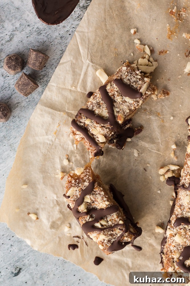 Date, Caramel and Nougat Bars Recipe 9 one Date Caramel Nougat Bar broken in half
