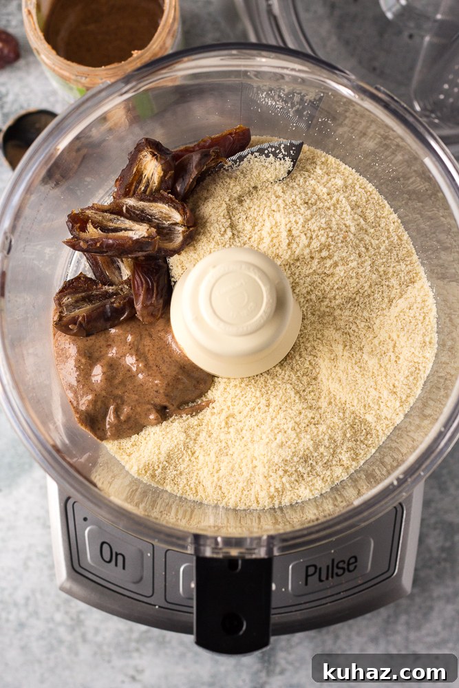 Date, Caramel and Nougat Bars Recipe 3 dates, almond butter, and almond flour in blender