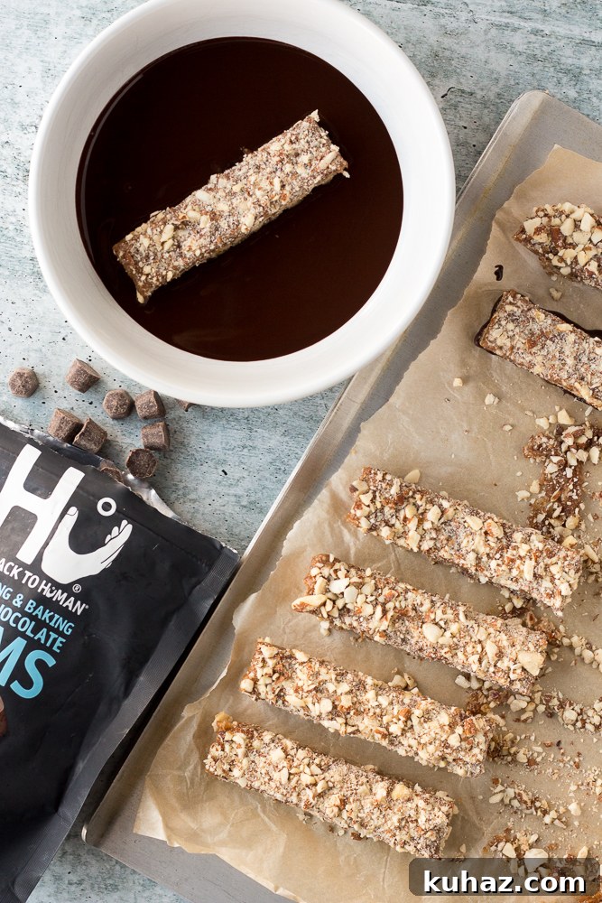 Date, Caramel and Nougat Bars Recipe 7 Date Caramel Nougat Bars dipped in dark chocolate