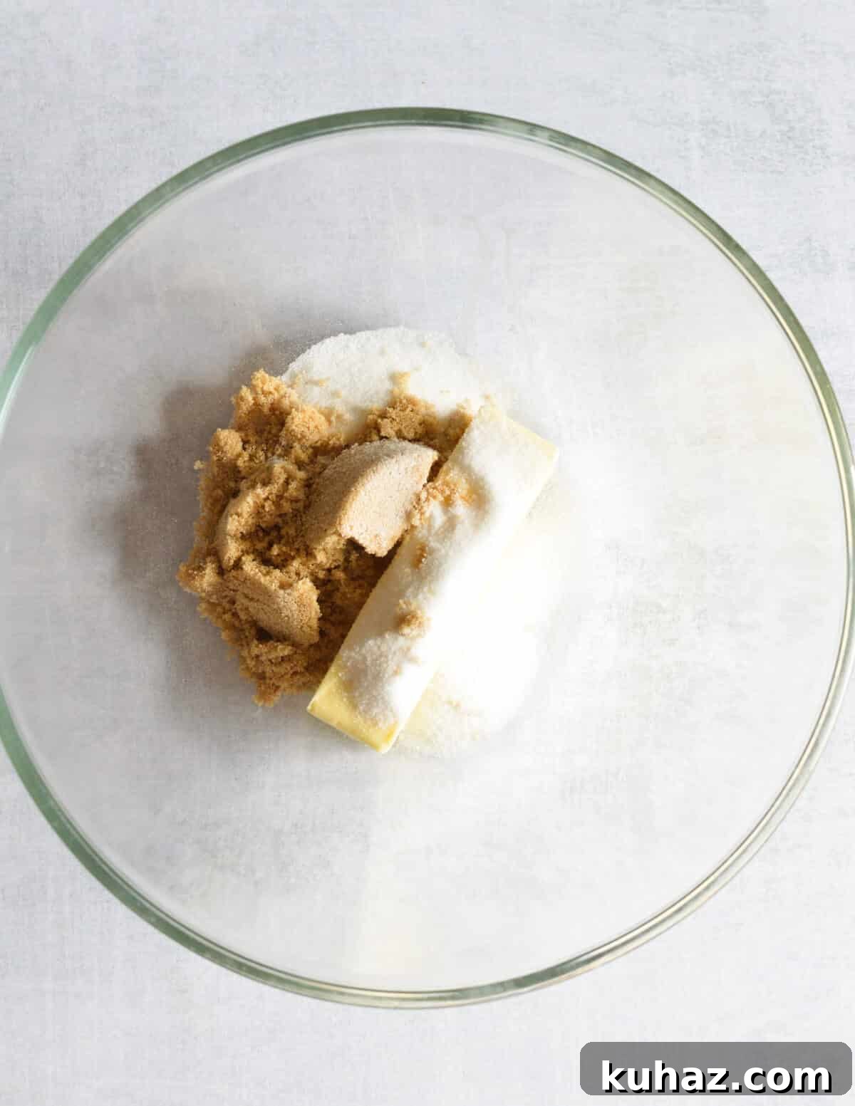 Soft and Chewy Almond Flour Chocolate Chip Cookie Recipe 4 a bowl of butter, sugar, and brown sugar.