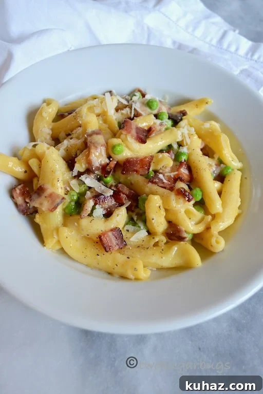 Favorite Pasta Carbonara. Comes together quickly with five ingredients, perfect for a busy night, but special enough for a dinner party. #twosugarbugs #pastacarbonara #pasta #dinnerisserved
