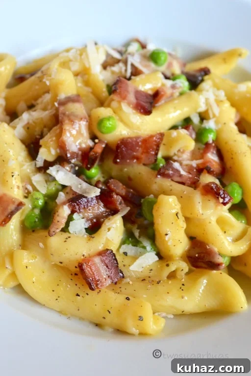 Favorite Pasta Carbonara. Comes together quickly with five ingredients, perfect for a busy night, but special enough for a dinner party. #twosugarbugs #pastacarbonara #pasta #dinnerisserved