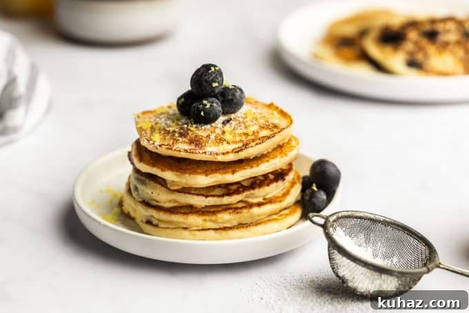 Fluffy Lemon Blueberry Pancakes with Maple Syrup 3 Batter with blueberries