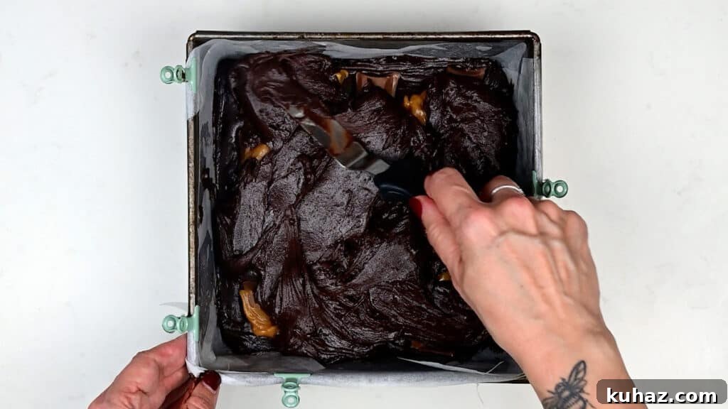 Salted Caramel Brownies Recipe with Gooey Caramel Swirls 8 Salted caramel brownies in square pan