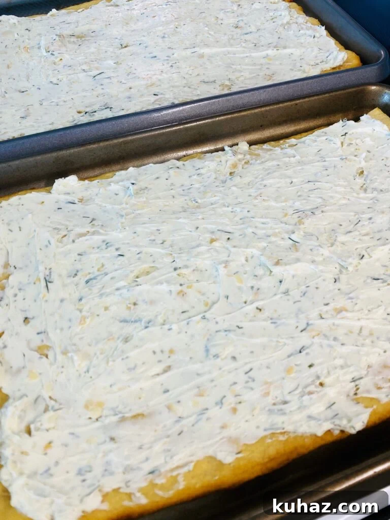 Smoked Veggie Pizza on a Traeger Grill 5 pizza with cheese spread over the crust