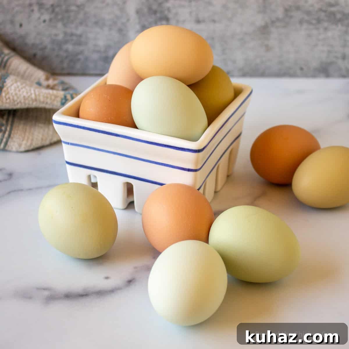 How to Make Perfect Sunny Side Up Eggs 4 Different colored eggs in a basket.
