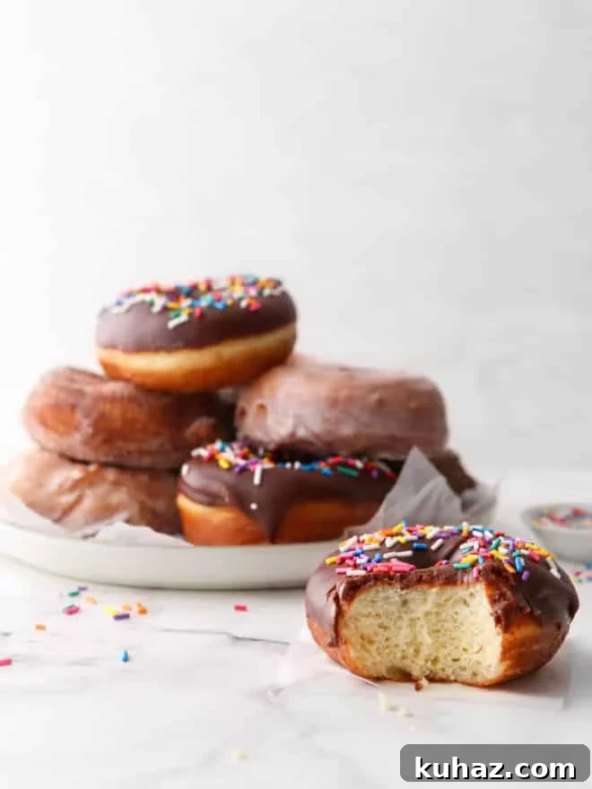 yeast-raised doughnut with a bite out of it