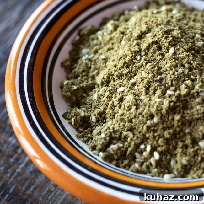 Crispy Roasted Cauliflower with Tahini and Dates 6 Zaatar spice mix in a small bowl.