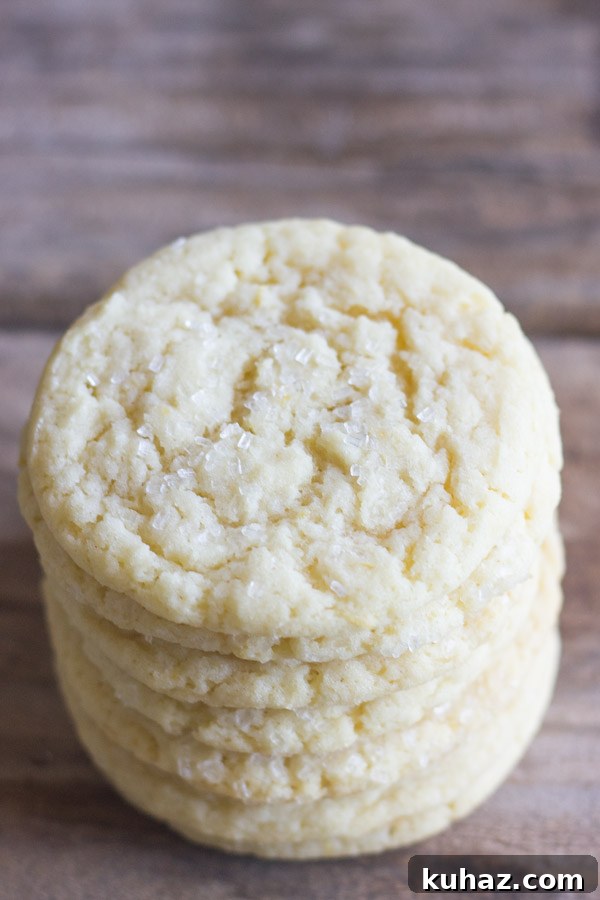 Soft, Chewy Bakery-Style Sugar Cookie Recipe 3 Bakery Style Sugar Cookies in a stack of seven.