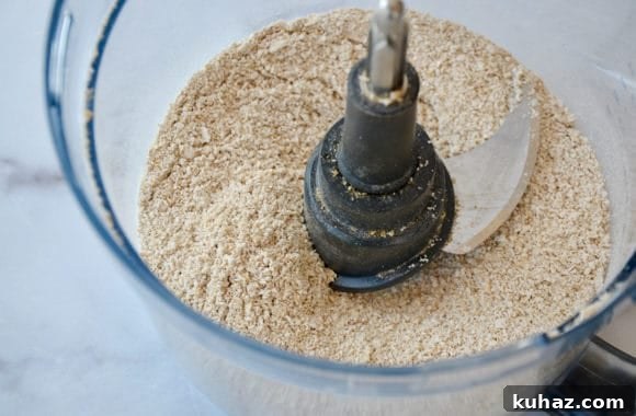 Edible Cookie Dough: Flourless, Eggless Recipe 3 A food processor bowl containing oat flour