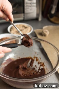 Homemade Chocolate Hazelnut Rum Truffles Recipe 12 making a rum truffle with spoons
