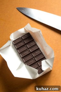 Homemade Chocolate Hazelnut Rum Truffles Recipe 3 bar of chocolate on cutting board