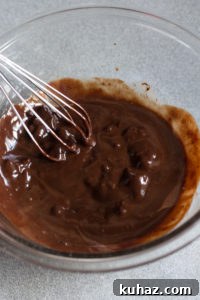 Homemade Chocolate Hazelnut Rum Truffles Recipe 6 partially melted chocolate in a bowl