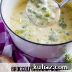 Bowl of Broccoli Cheddar Soup topped with extra cheddar