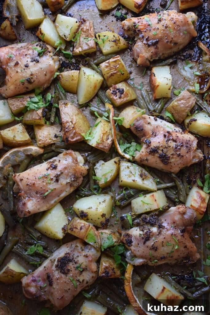 Sheet Pan Lemon Herb Chicken with Roasted Vegetables 9 Baked lemon chicken dinner.