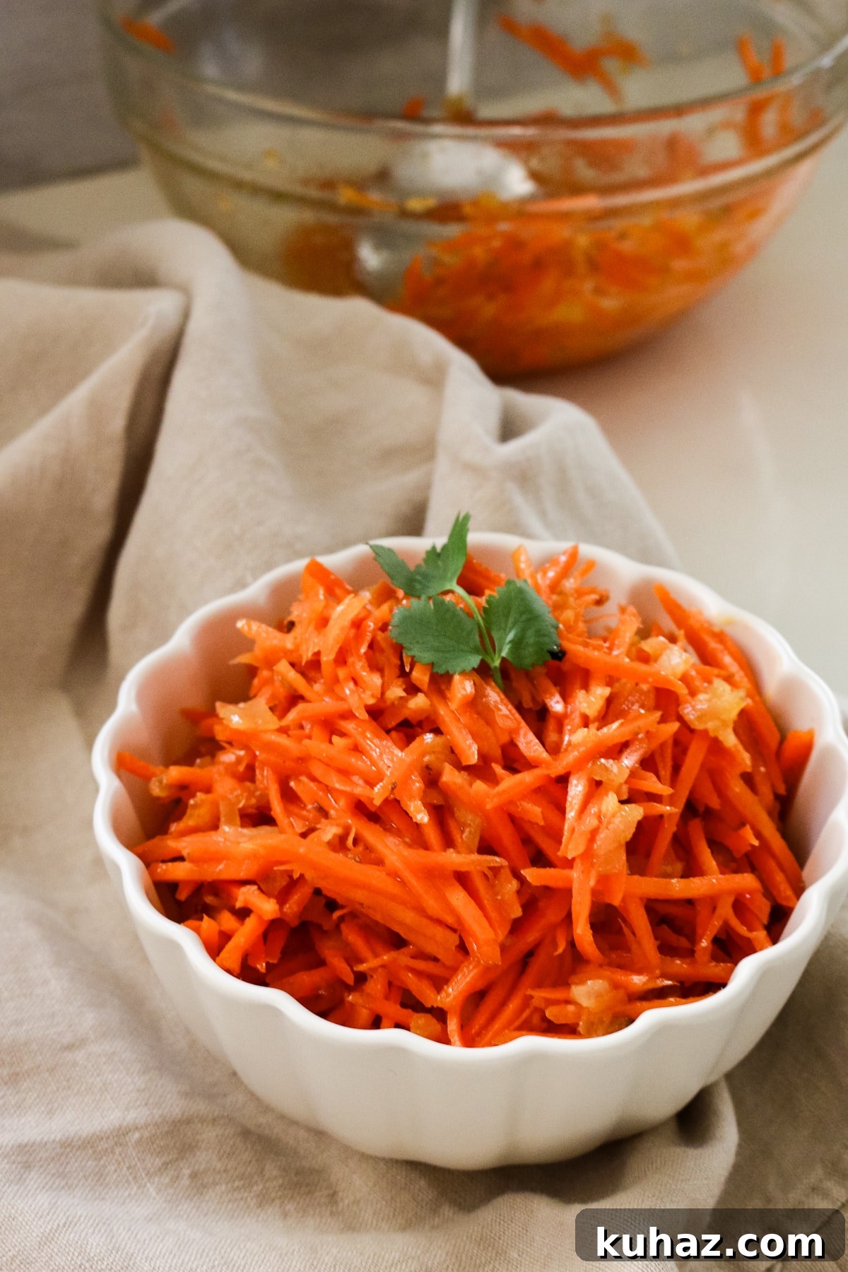 Spicy Morkovcha Korean Carrot Salad Recipe 2 korean carrot salad in white bowl.