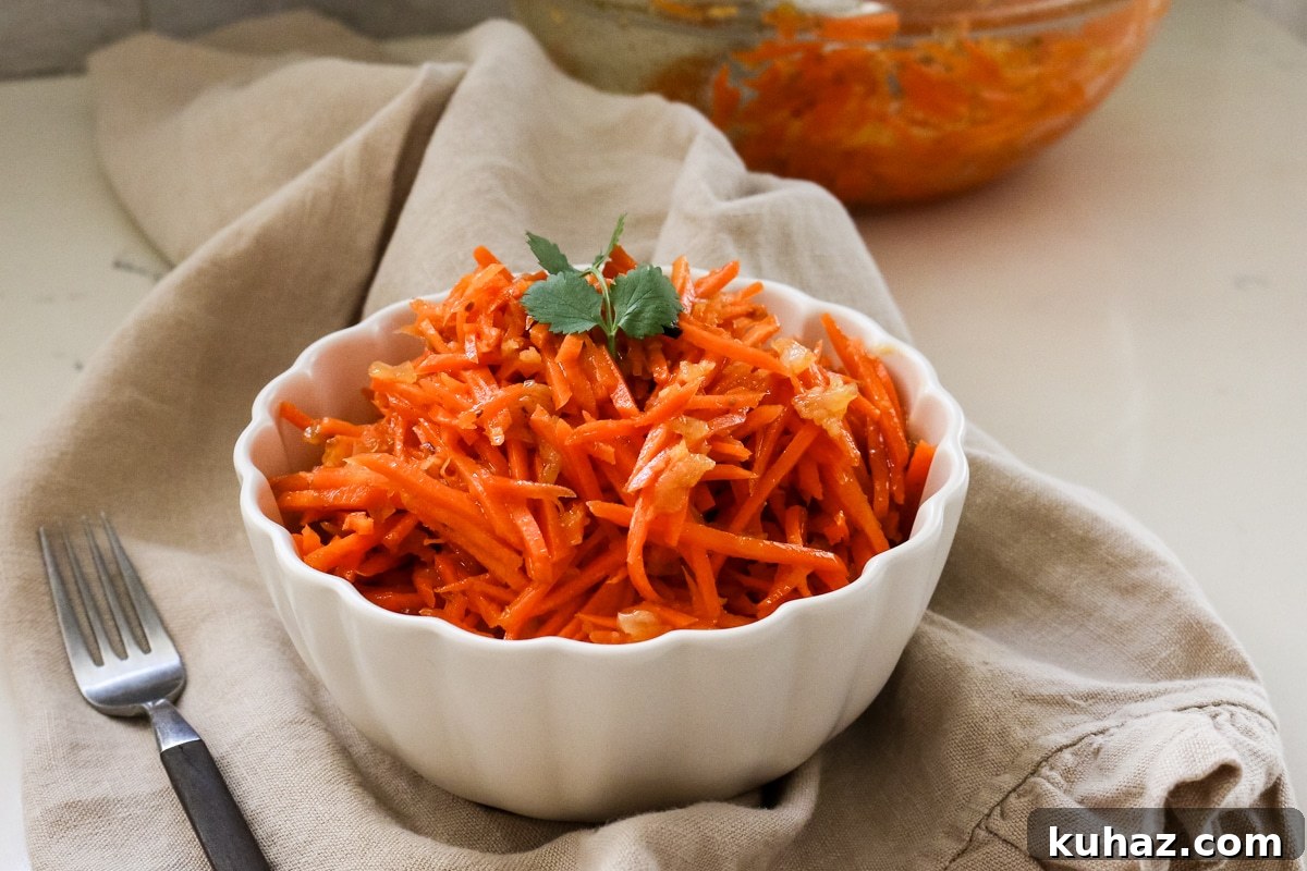 Spicy Morkovcha Korean Carrot Salad Recipe 10 korean carrot salad in a white bowl.